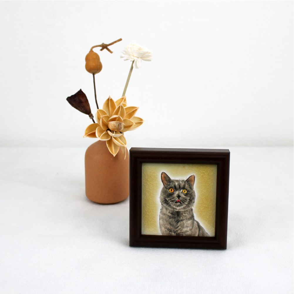 Hand painted ceramic cat portrait in small wooden frame